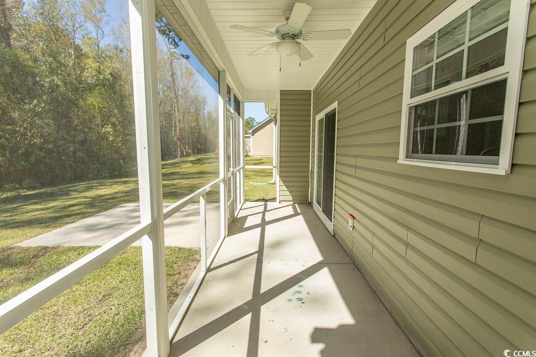 126 Allsbrook Road Loris, SC 29569 - Photo 6 of 30 Unfurnished sunroom featuring ceiling fan