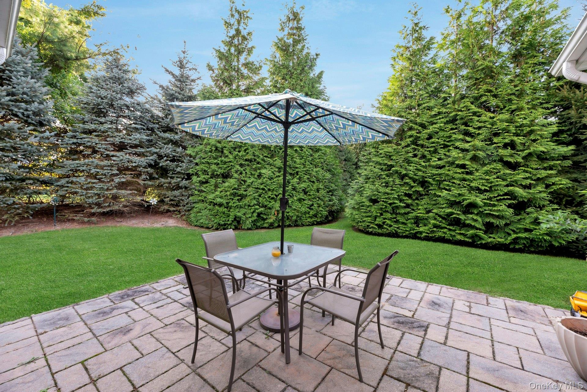 159 Stoneleigh Drive Riverhead, NY 11901 - Photo 5 of 24 View of patio / terrace featuring outdoor dining area