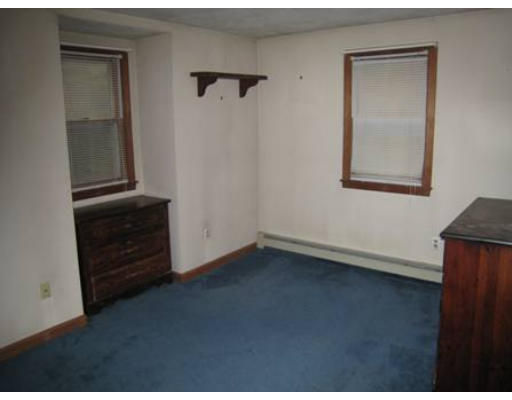 611 Piper Road Ashby, MA 01431 - Photo 5 of 9 a view of an empty room and wooden floor