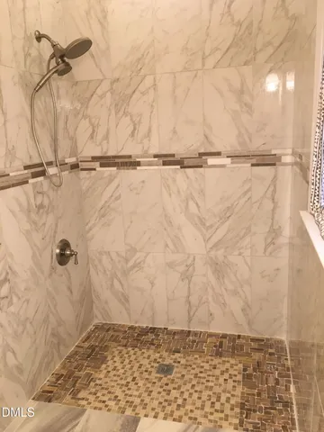 a close view of a shower in a bathroom
