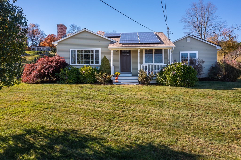 120 Stebbins Road Monson, MA 01057 - Photo 2 of 41 a front view of a house with a yard