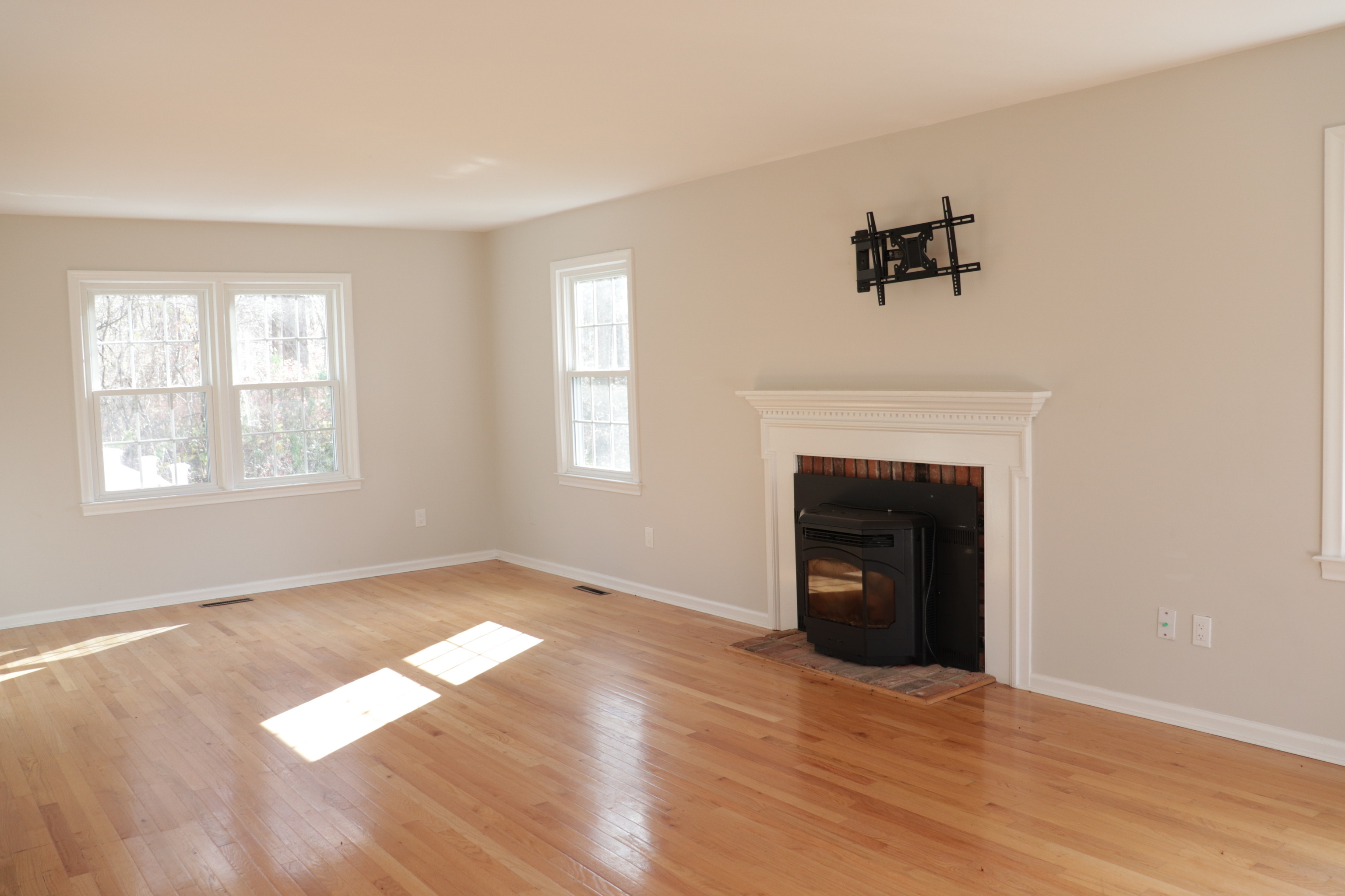 Undisclosed Address Woodbury, CT 06798 - Photo 12 of 27 a view of an empty room with window and fire place