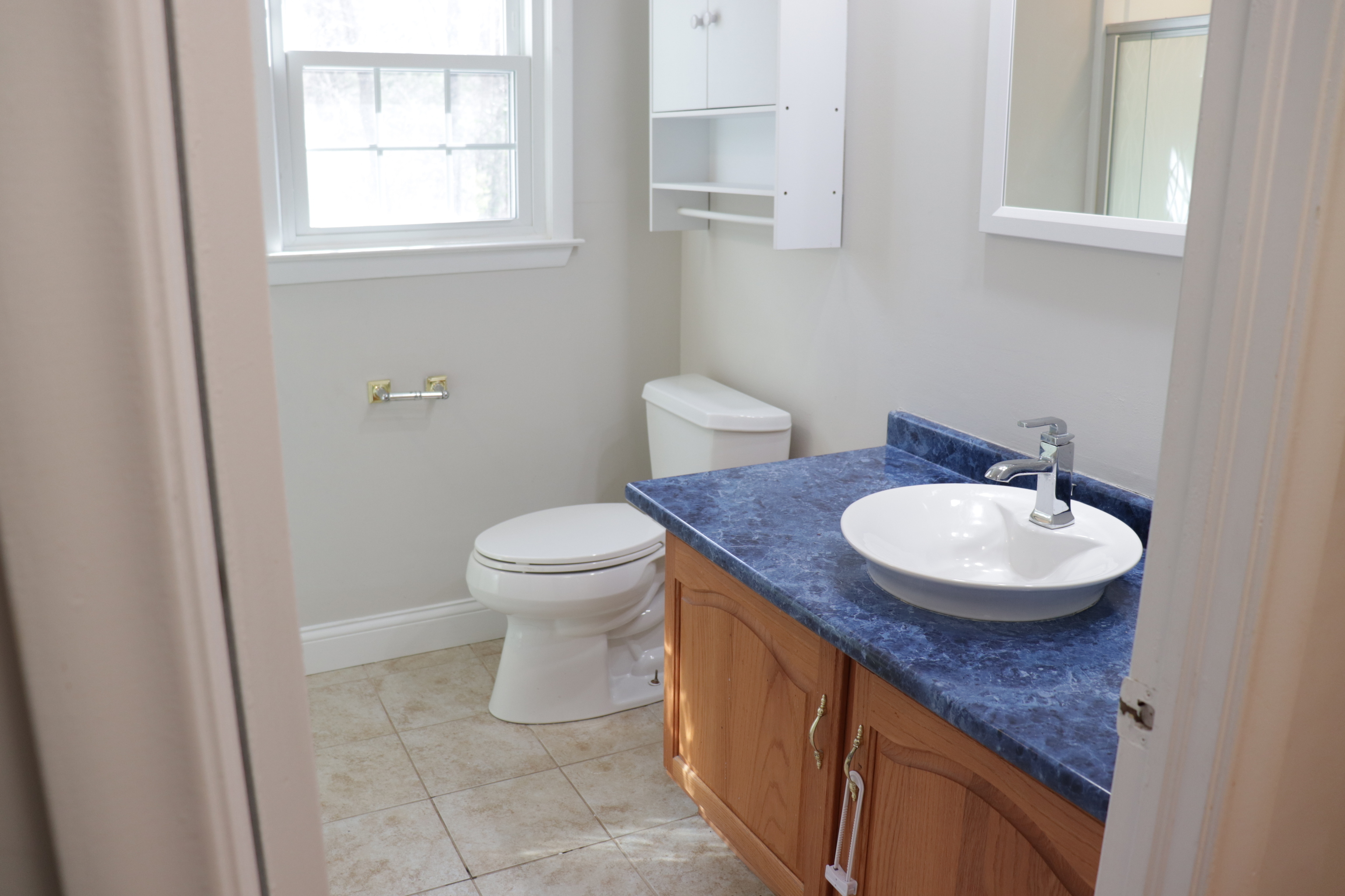 Undisclosed Address Woodbury, CT 06798 - Photo 20 of 27 a bathroom with a granite countertop sink and a toilet