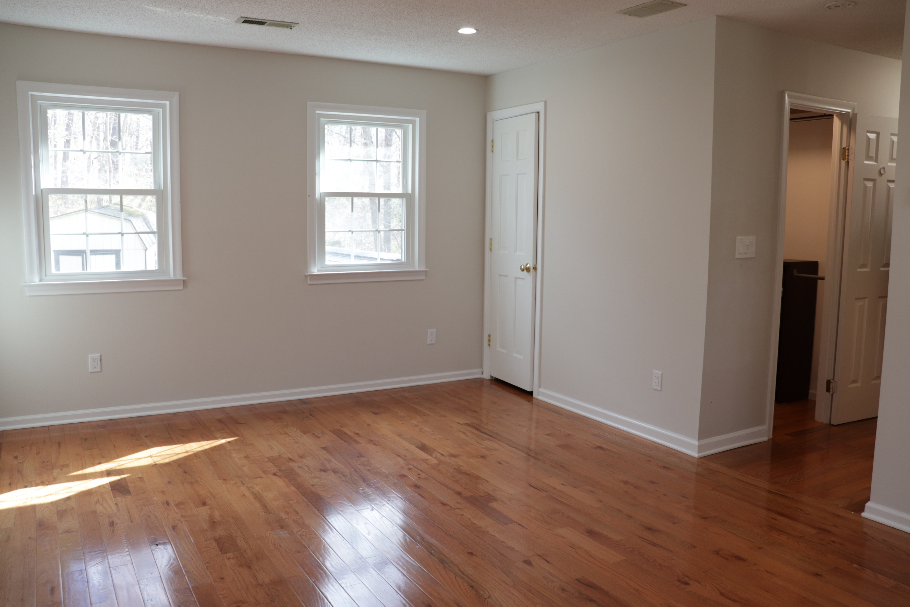 Undisclosed Address Woodbury, CT 06798 - Photo 22 of 27 a view of an empty room with wooden floor and a window