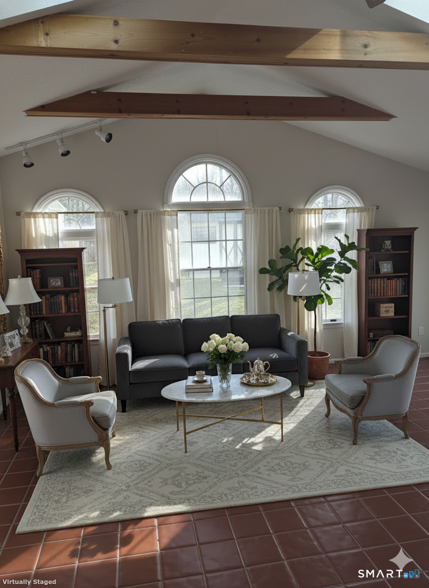 Undisclosed Address Woodbury, CT 06798 - Photo 6 of 27 a living room with furniture and a large window