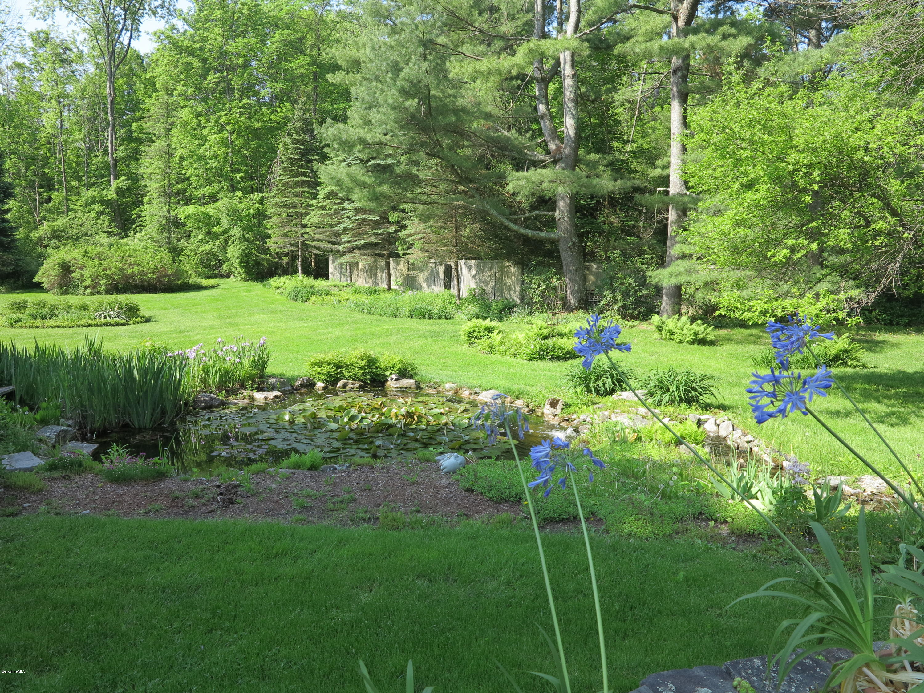 3 Quiet Knoll Road Stockbridge, MA 01266 - Photo 16 of 17 a view of a garden with a tree