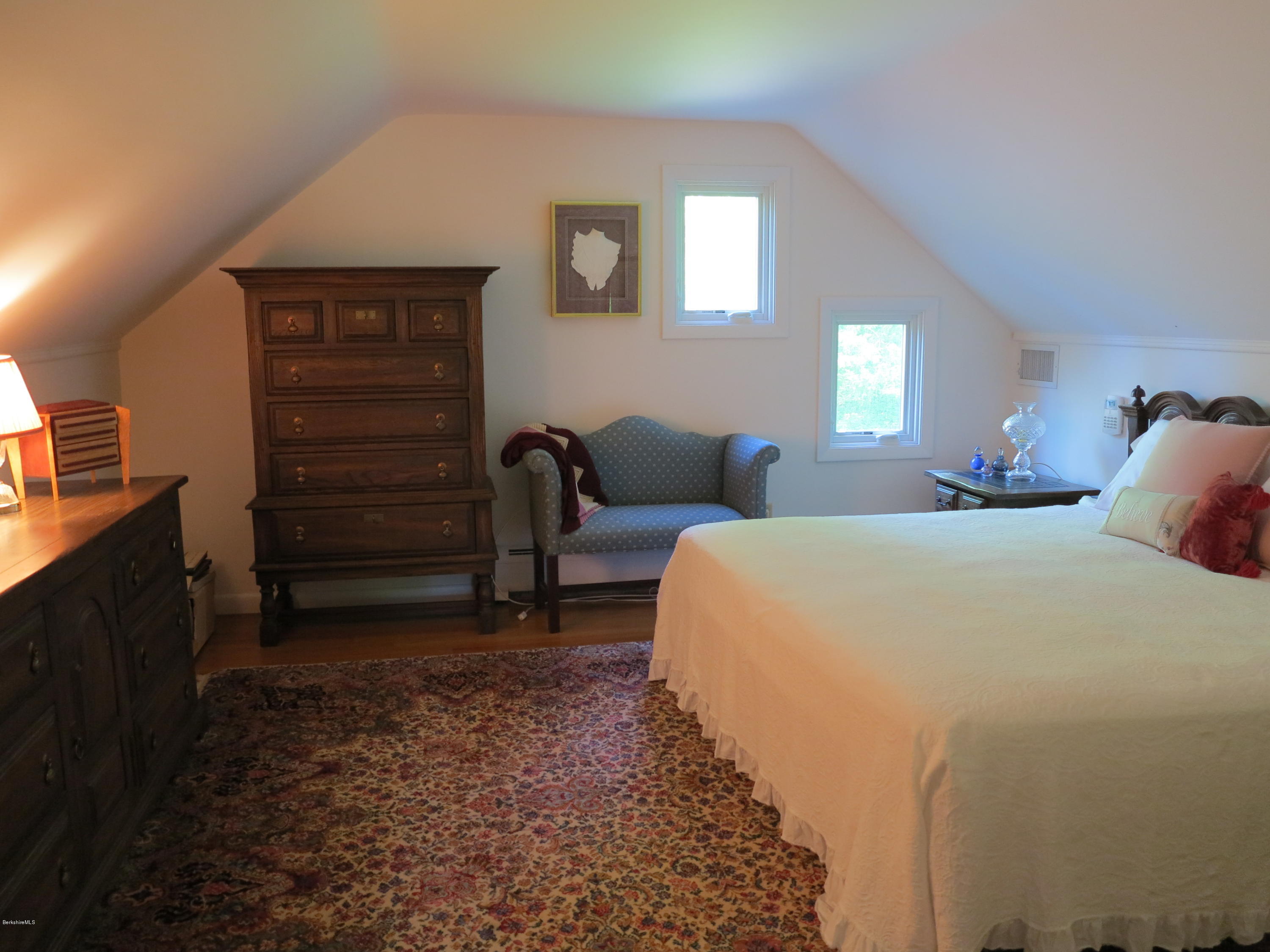 3 Quiet Knoll Road Stockbridge, MA 01266 - Photo 10 of 17 a bedroom with a bed and a dresser