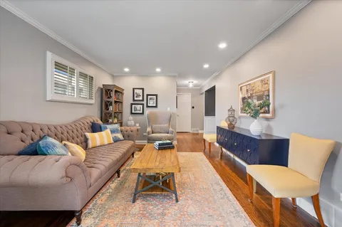 a living room with furniture and a couch