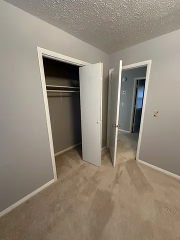 an empty room with closet
