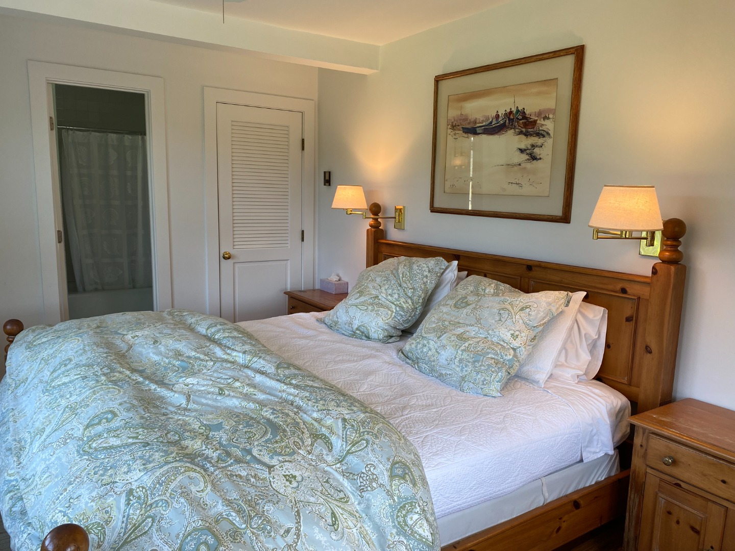 76 Baxter Road Nantucket, MA 02554 - Photo 11 of 25 a bedroom with a bed and painting on the wall