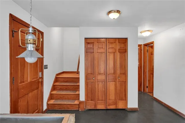 a view of entryway with stairs