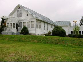177 Potomac River Road Monterey, VA 24465 - Photo 1 of 7 a front view of a house with a garden