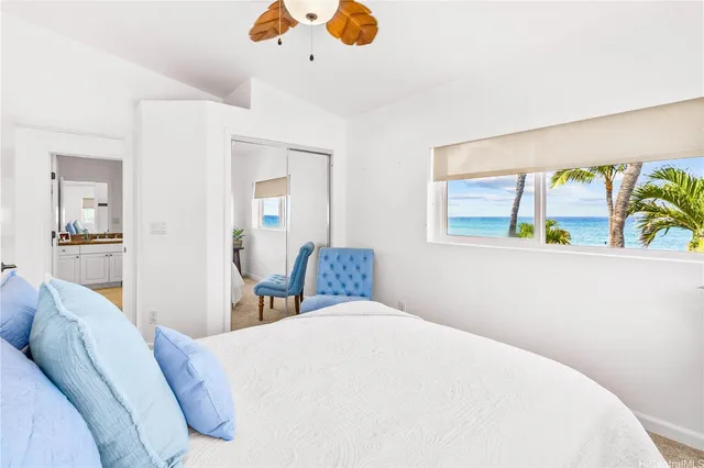 a bedroom with a bed and dresser