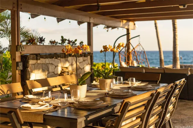 a view of swimming pool with outdoor seating