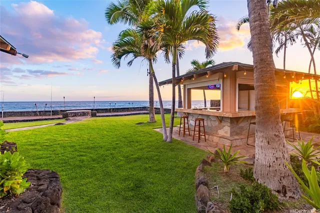 a view of a swimming pool with a garden