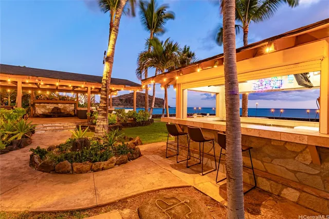 a view of a swimming pool with a patio
