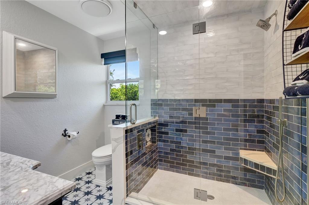 193 Cocohatchee Street Naples, FL 34110 - Photo 14 of 50 Upstairs large walk in shower