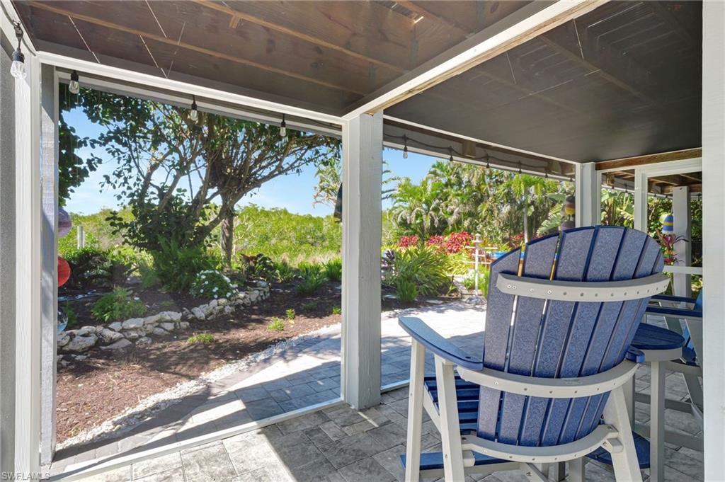 193 Cocohatchee Street Naples, FL 34110 - Photo 43 of 50 Screened patio