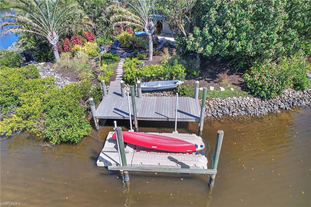 193 Cocohatchee Street Naples, FL 34110 - Photo 44 of 50 Floating dock and two-rack canoe storage
