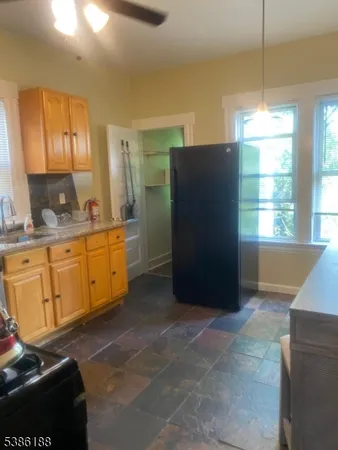 a view of a kitchen with a sink