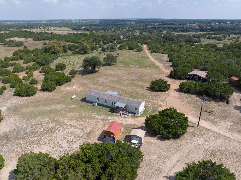 17787 Fm 963 Bertram, TX 78605 - Photo 16 of 40 an aerial view of a house with a yard