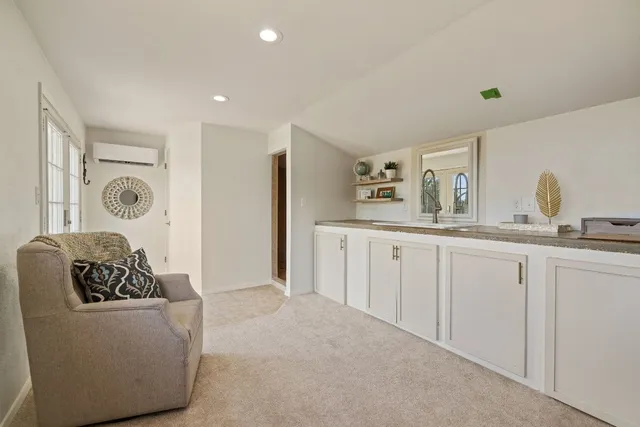 a backyard of a house with wooden fence