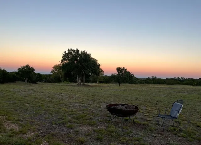 a view of a pathway both side of yard