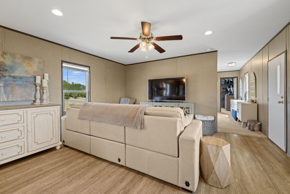 17787 Fm 963 Bertram, TX 78605 - Photo 8 of 40 a living room with furniture and a flat screen tv