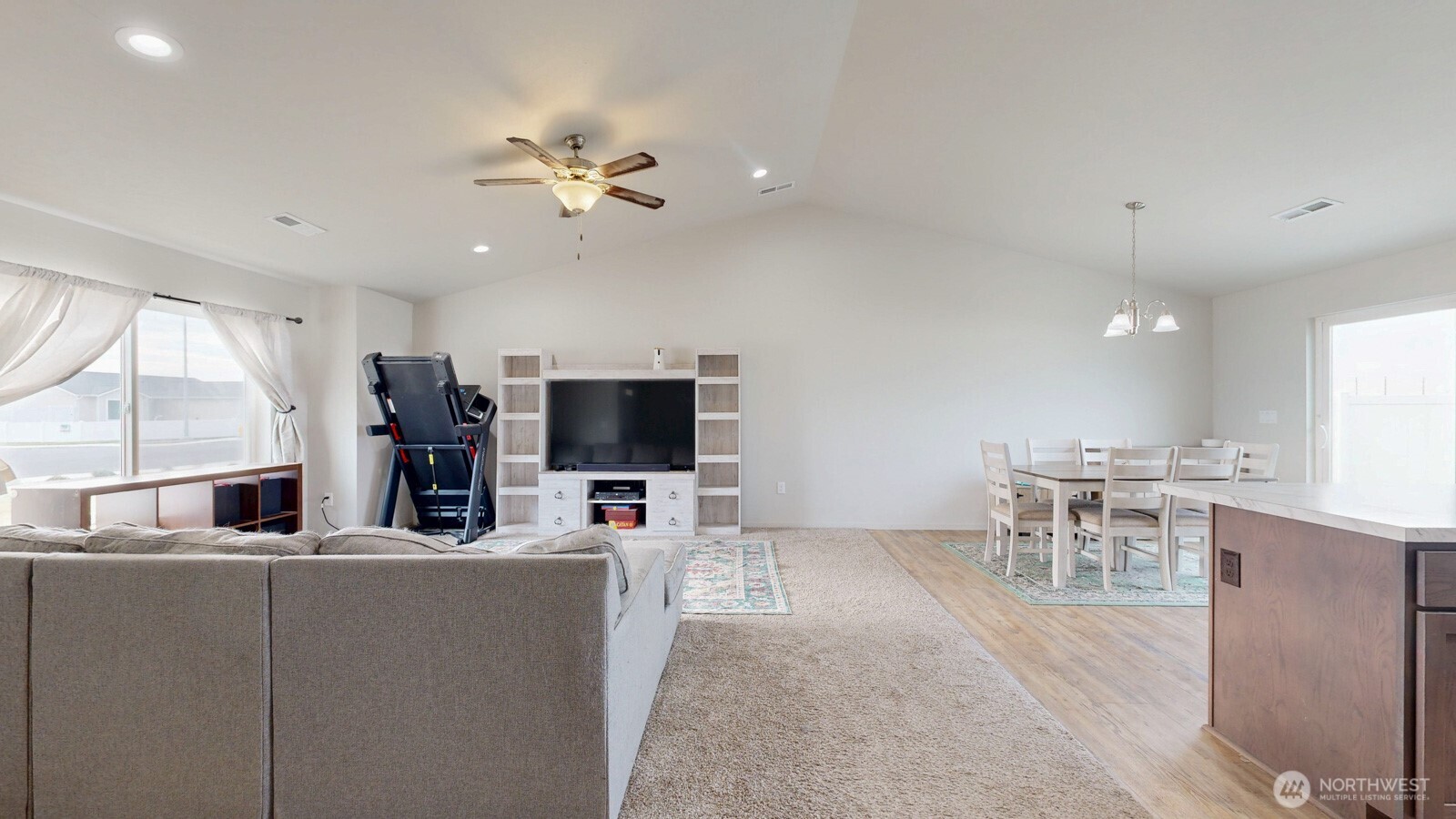 907 East Cascade Street Othello, WA 99344 - Photo 12 of 27 a living room with furniture and a flat screen tv