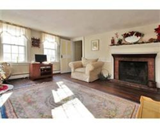 8 Hill Road Boxborough, MA 01719 - Photo 4 of 17 a living room with furniture window and a fireplace