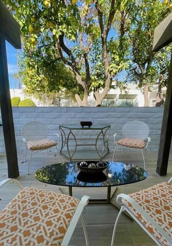 a view of outdoor dining space with a patio