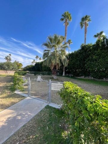 a view of a street with tall buildings