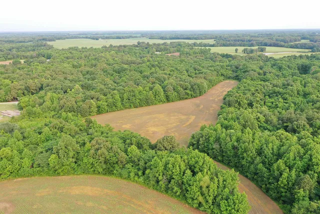 an aerial view of mountain with outdoor space