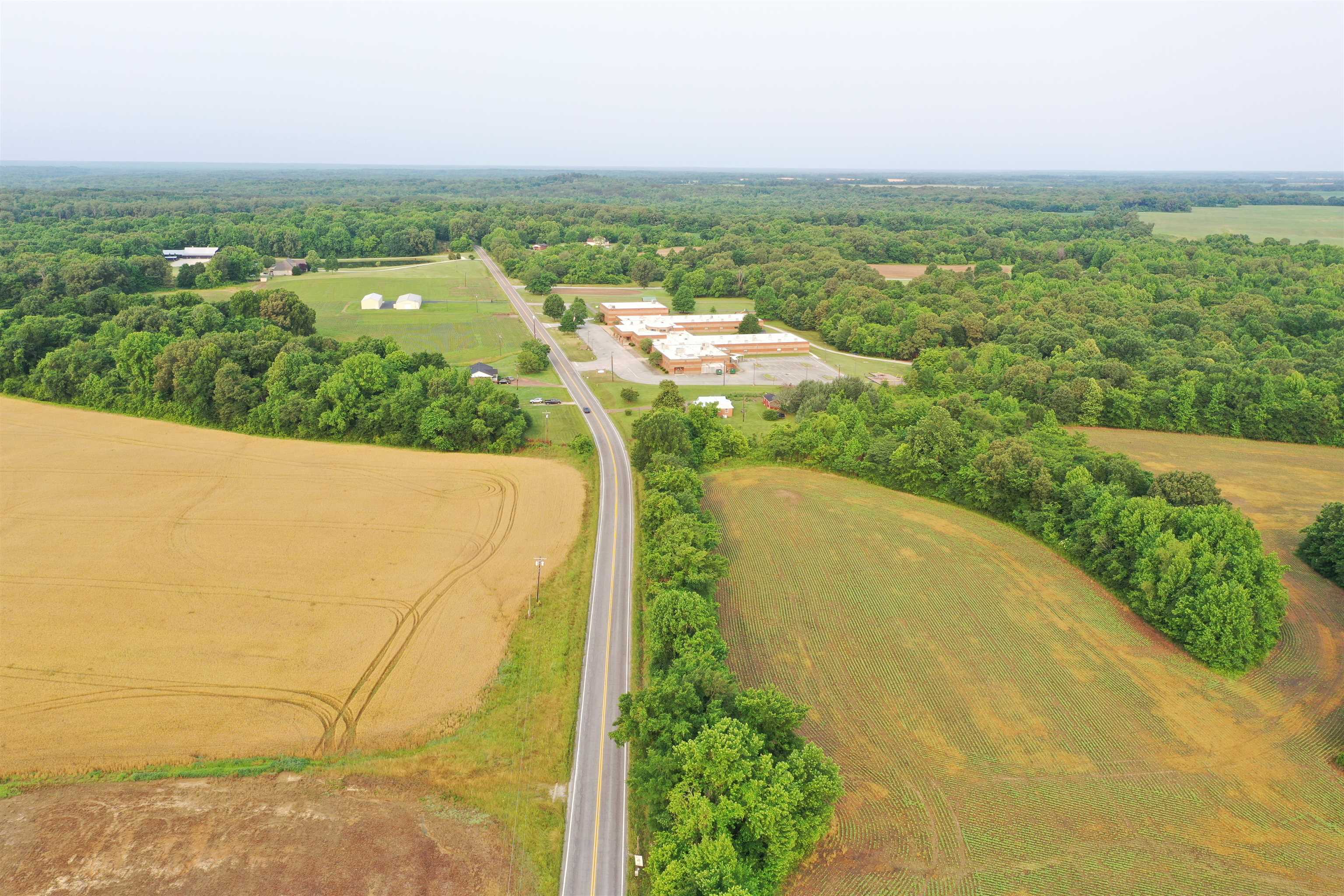 1858 Denmark Jackson Road Denmark, TN 38391 - Photo 24 of 35 an aerial view of residential houses with outdoor space and trees