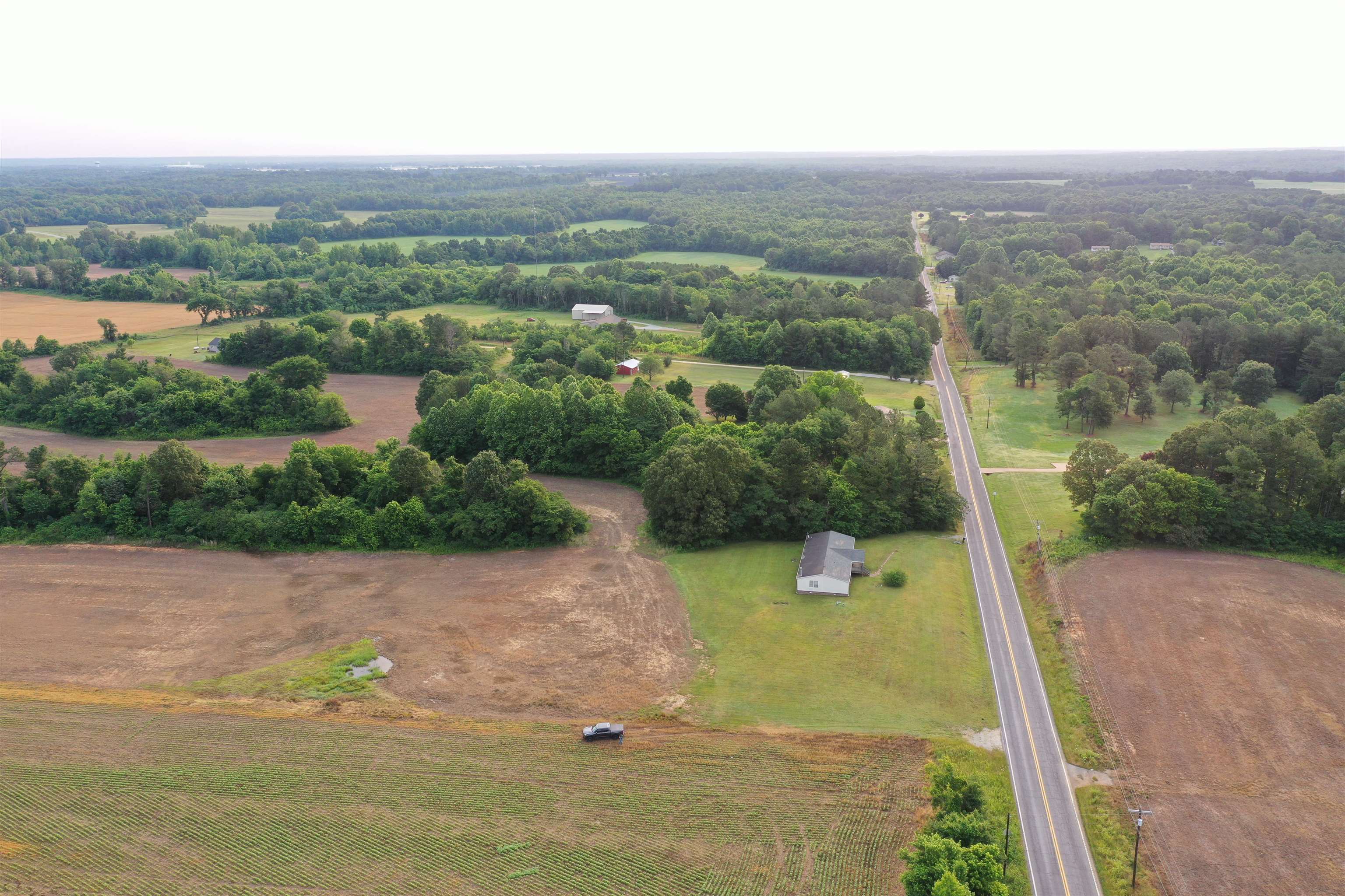 1858 Denmark Jackson Road Denmark, TN 38391 - Photo 3 of 35 an aerial view of a house with a yard