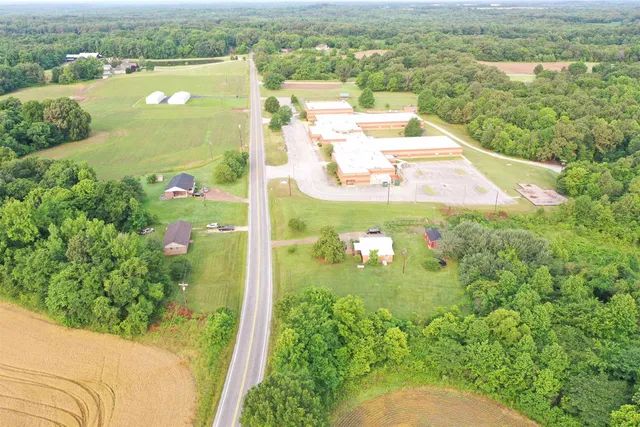a view of a field with an ocean