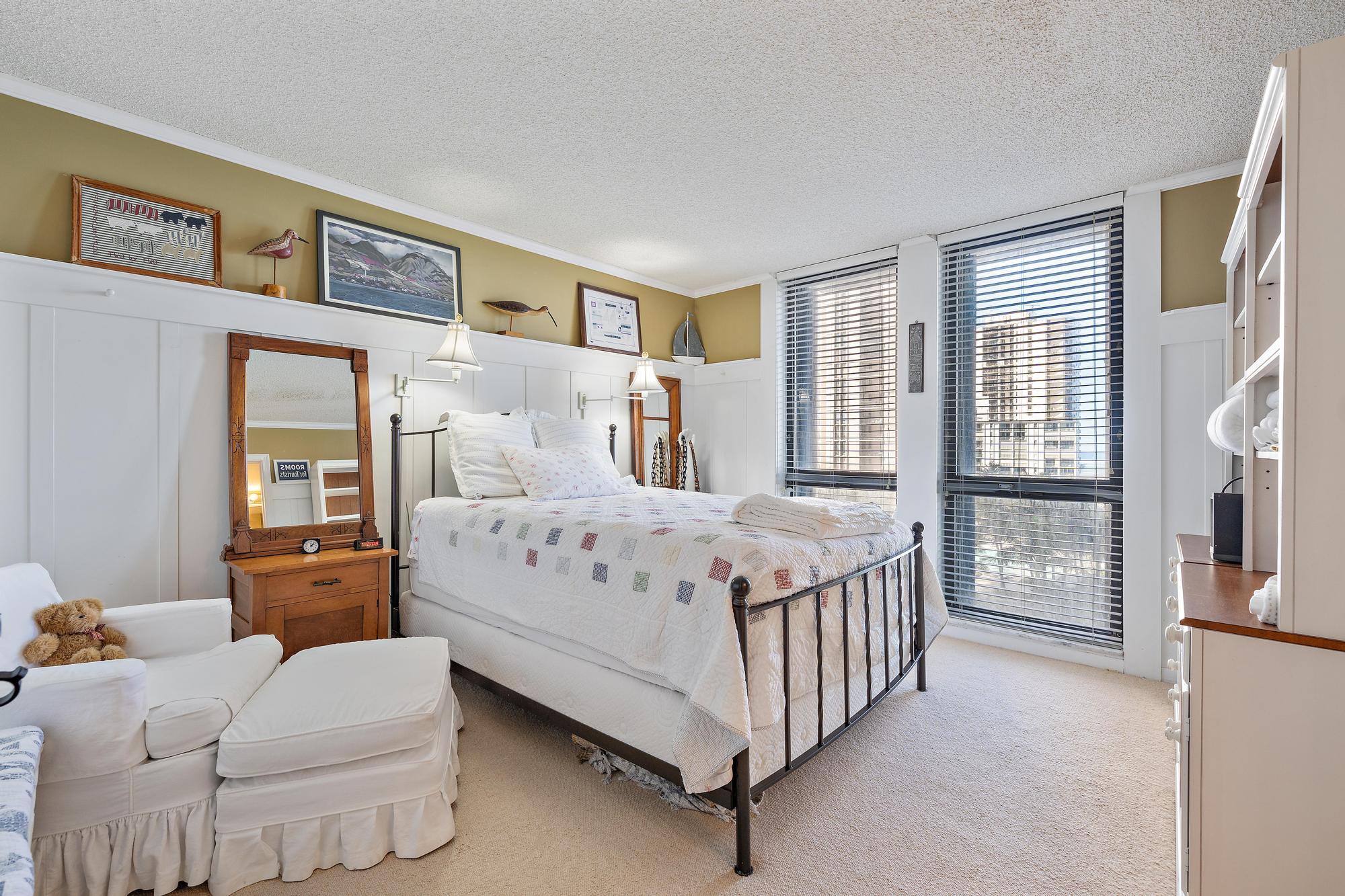 5380 North Ocean Drive, Unit 6D Singer Island, FL 33404 - Photo 21 of 41 a bedroom with a bed couch and a window