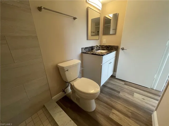 a view of an empty room with a large window