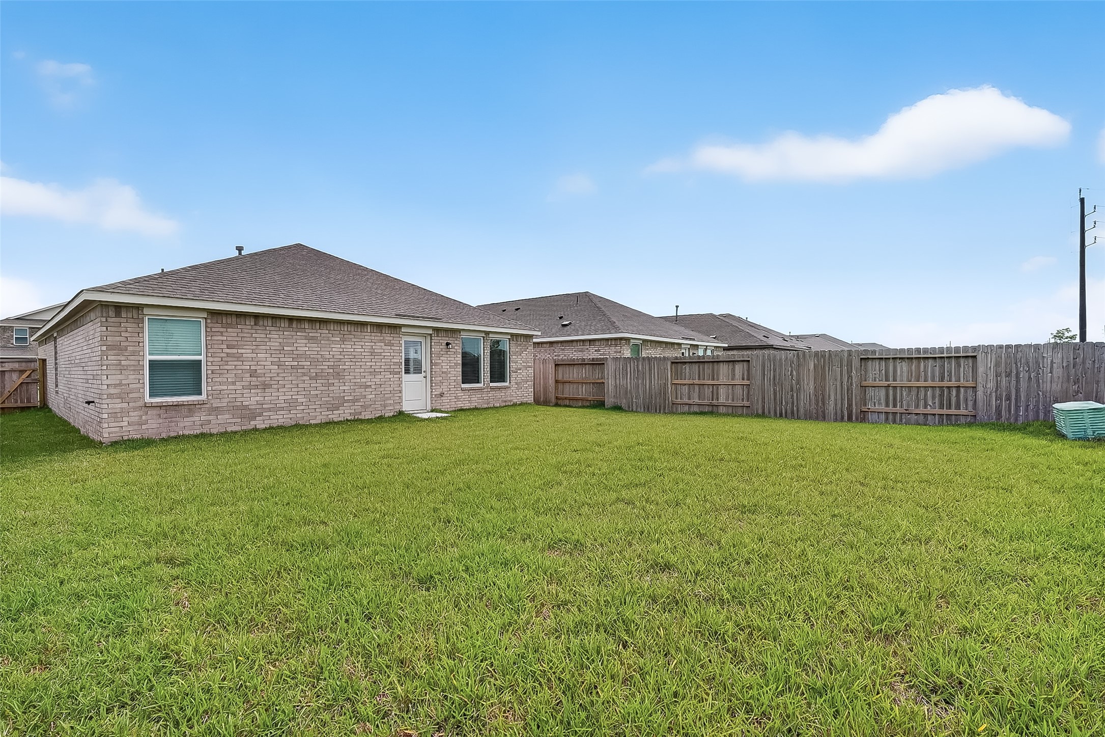 2623 American Ruby Drive Rosharon, TX 77583 - Photo 14 of 14 The corner lot gives the house a large backyard.
