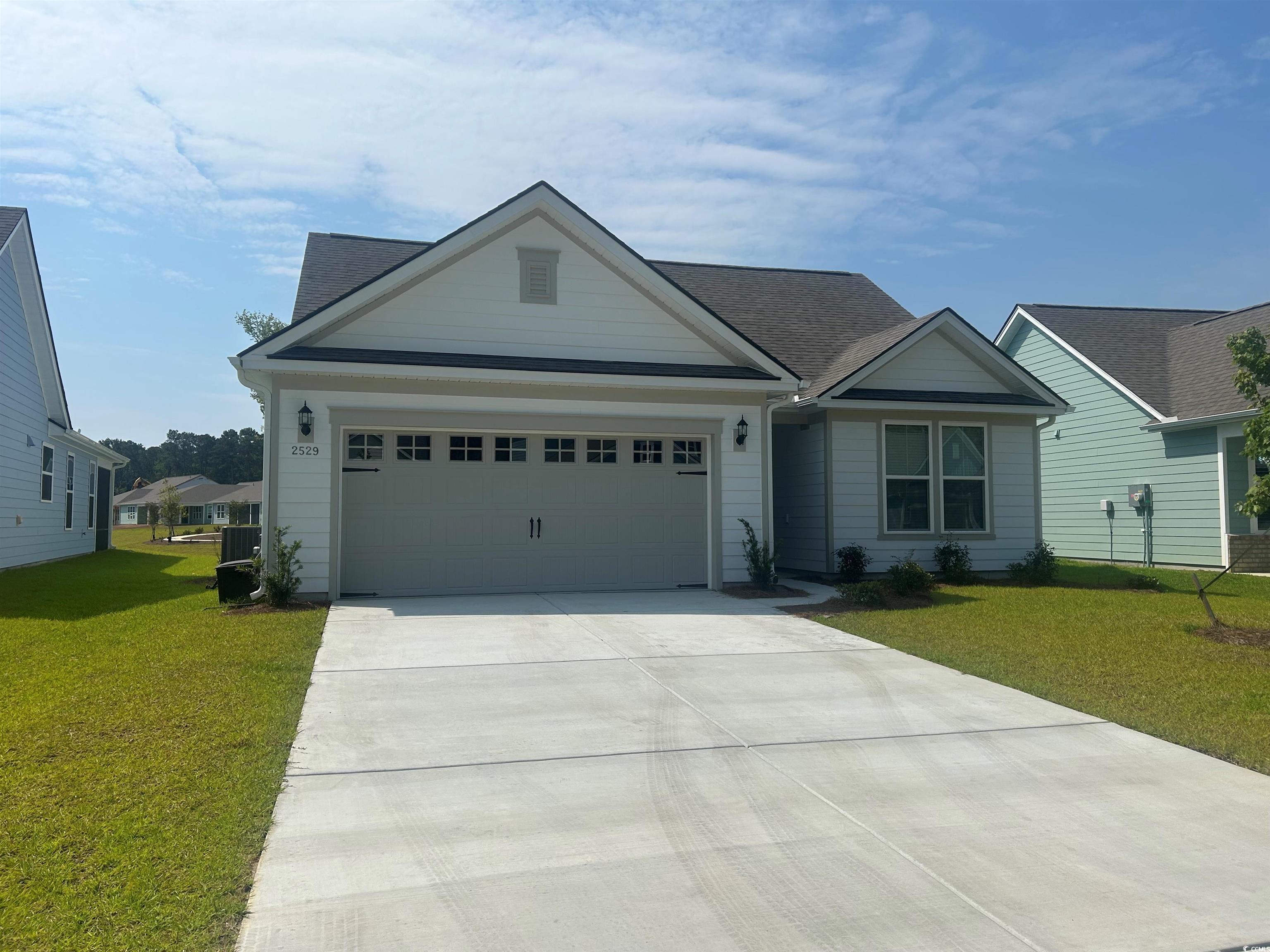 2529 Watershed Way Longs, SC 29568 - Photo 1 of 1 View of front of property with concrete driveway,