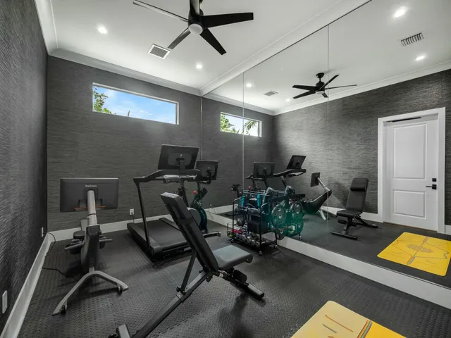 a view of a hallway with wooden shelves