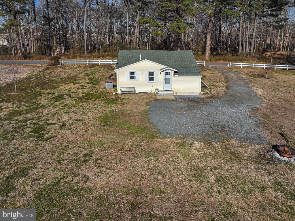 9530 Peerless Road Bishopville, MD 21813 - Photo 36 of 51 a view of white house with a yard