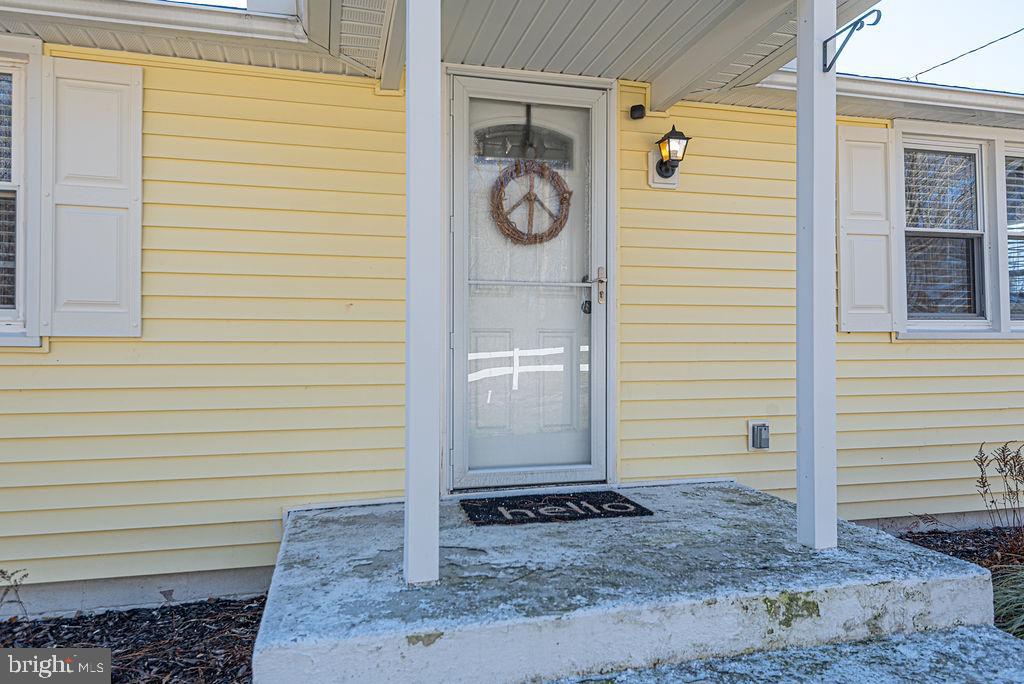 9530 Peerless Road Bishopville, MD 21813 - Photo 4 of 51 a view of a door and a door