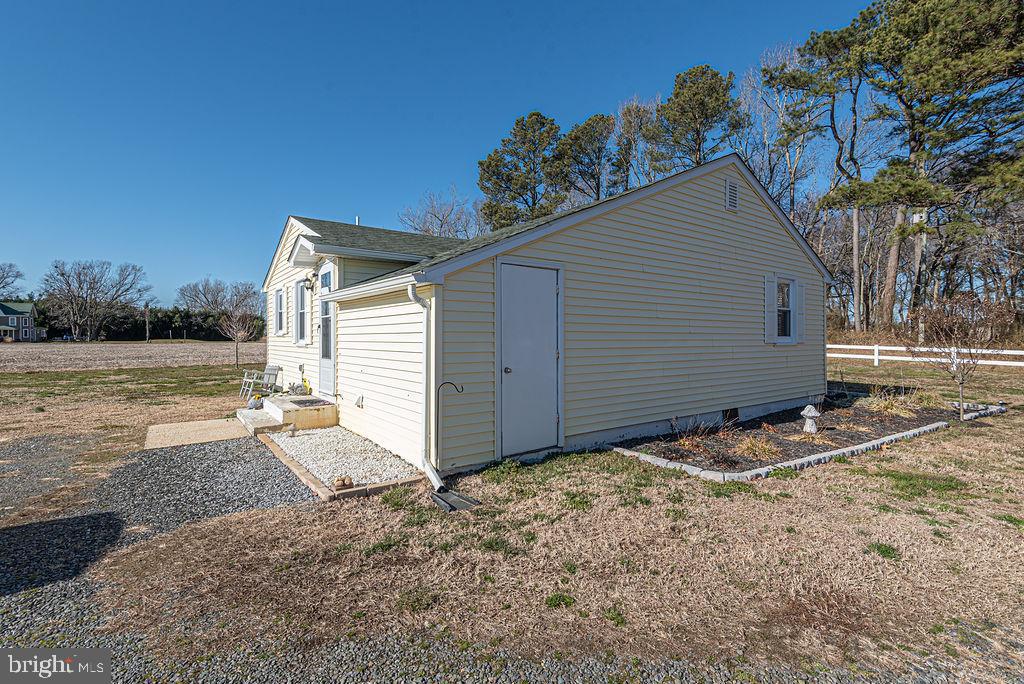 9530 Peerless Road Bishopville, MD 21813 - Photo 49 of 51 a view of a house with a yard