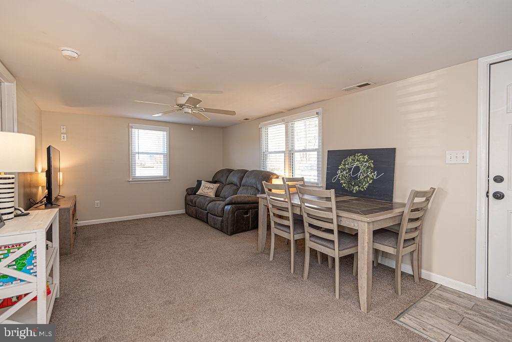 9530 Peerless Road Bishopville, MD 21813 - Photo 7 of 51 a view of a dining room with furniture window and outside view