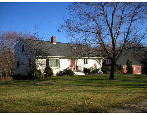 1037 Liberty Square Road Boxborough, MA 01719 - Photo 1 of 18 a view of building with yard