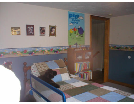 1037 Liberty Square Road Boxborough, MA 01719 - Photo 13 of 18 a living room with furniture and painting on the wall