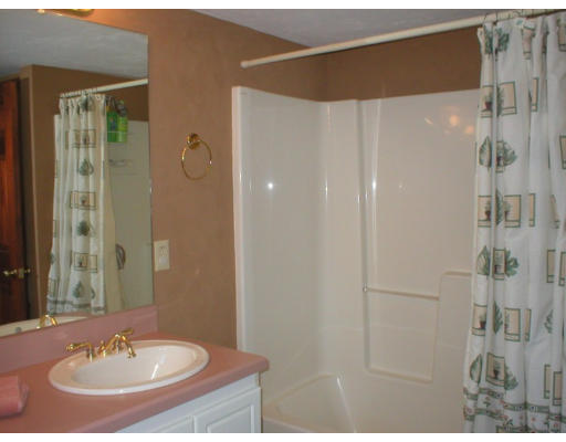 1037 Liberty Square Road Boxborough, MA 01719 - Photo 18 of 18 a bathroom with a sink and a mirror