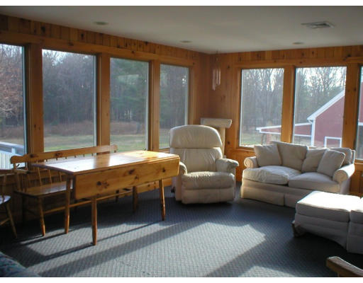1037 Liberty Square Road Boxborough, MA 01719 - Photo 5 of 18 a living room with furniture and large windows