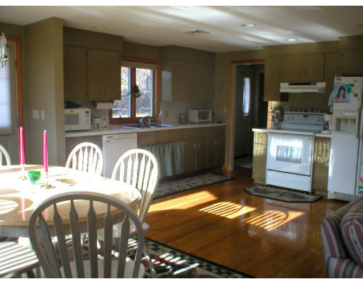 1037 Liberty Square Road Boxborough, MA 01719 - Photo 8 of 18 a view of a dining room with furniture
